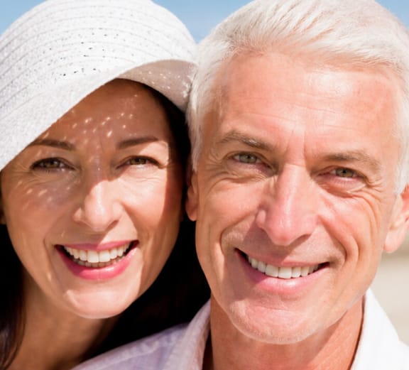 Dental implant patient smiling confidently