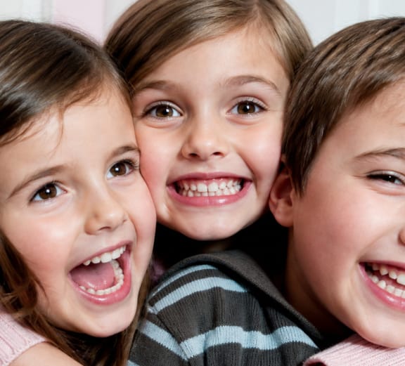 Smiling child in a pediatric dental office